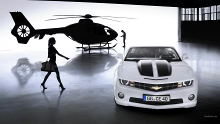 HD PC desktop wallpaper: white Chevrolet Camaro Convertible in a glossy hangar with a helicopter and silhouetted figures.
