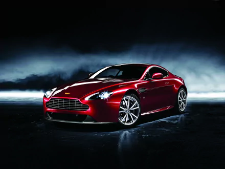Aston Martin Dragon 88 sports car in glossy red showcased on a dark, reflective surface, captured as a high-definition PC desktop wallpaper and background.