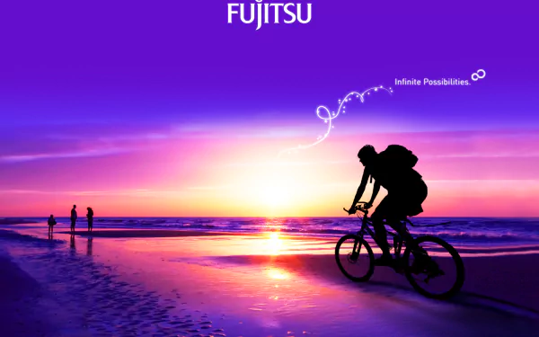 A vibrant Fujitsu HD desktop wallpaper featuring a silhouette of a cyclist on a beach at sunset with the tagline Infinite Possibilities against a purple sky.