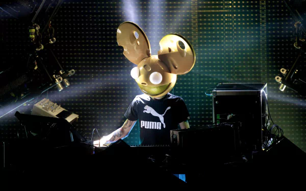 HD PC desktop wallpaper featuring Deadmau5 performing live, with his signature mouse helmet illuminated on stage amidst vibrant lighting effects.