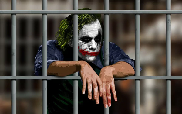 HD wallpaper depicting the Joker behind bars from The Dark Knight movie, focusing on his iconic makeup and disheveled appearance.