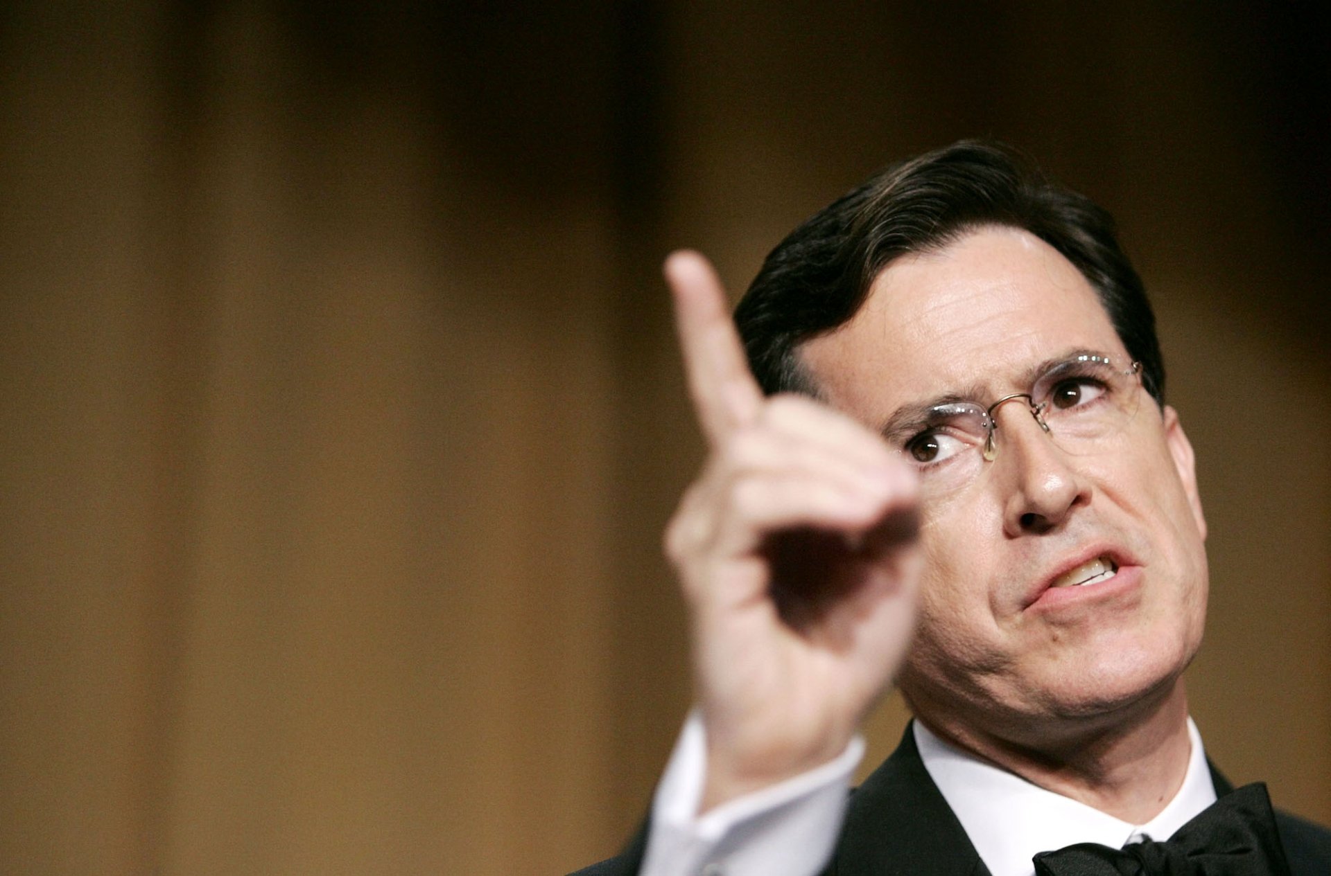 HD desktop wallpaper featuring a person gesturing with their hand, suitable as a background.