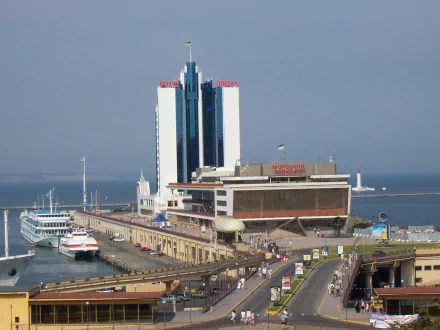 Man-made Odessa seafront with tall harbor terminal and docked ships, captured as an HD PC desktop wallpaper and background.