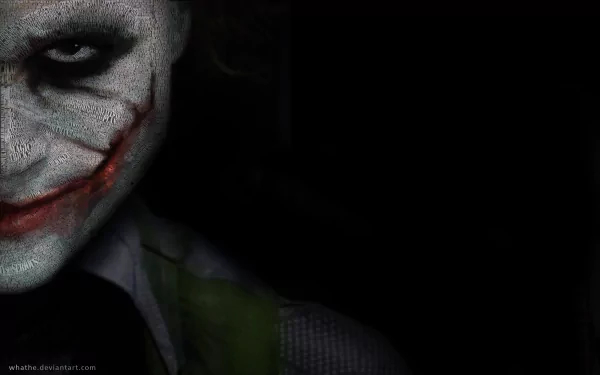 A striking 4K Ultra HD wallpaper featuring the Joker from The Dark Knight, showcasing the character's menacing grin against a dark backdrop.
