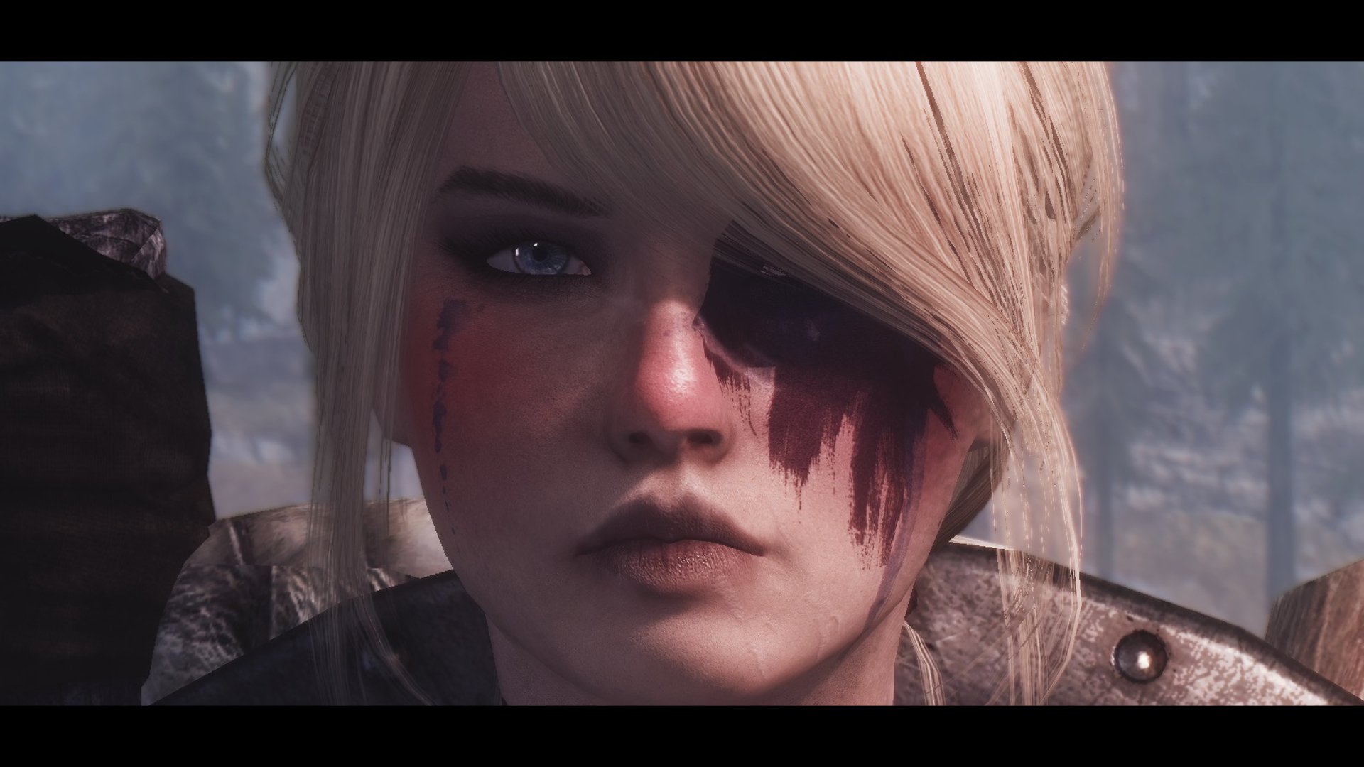 A close-up portrait of a character from The Elder Scrolls V: Skyrim, featuring striking facial markings and a dramatic expression against a blurred, natural background.