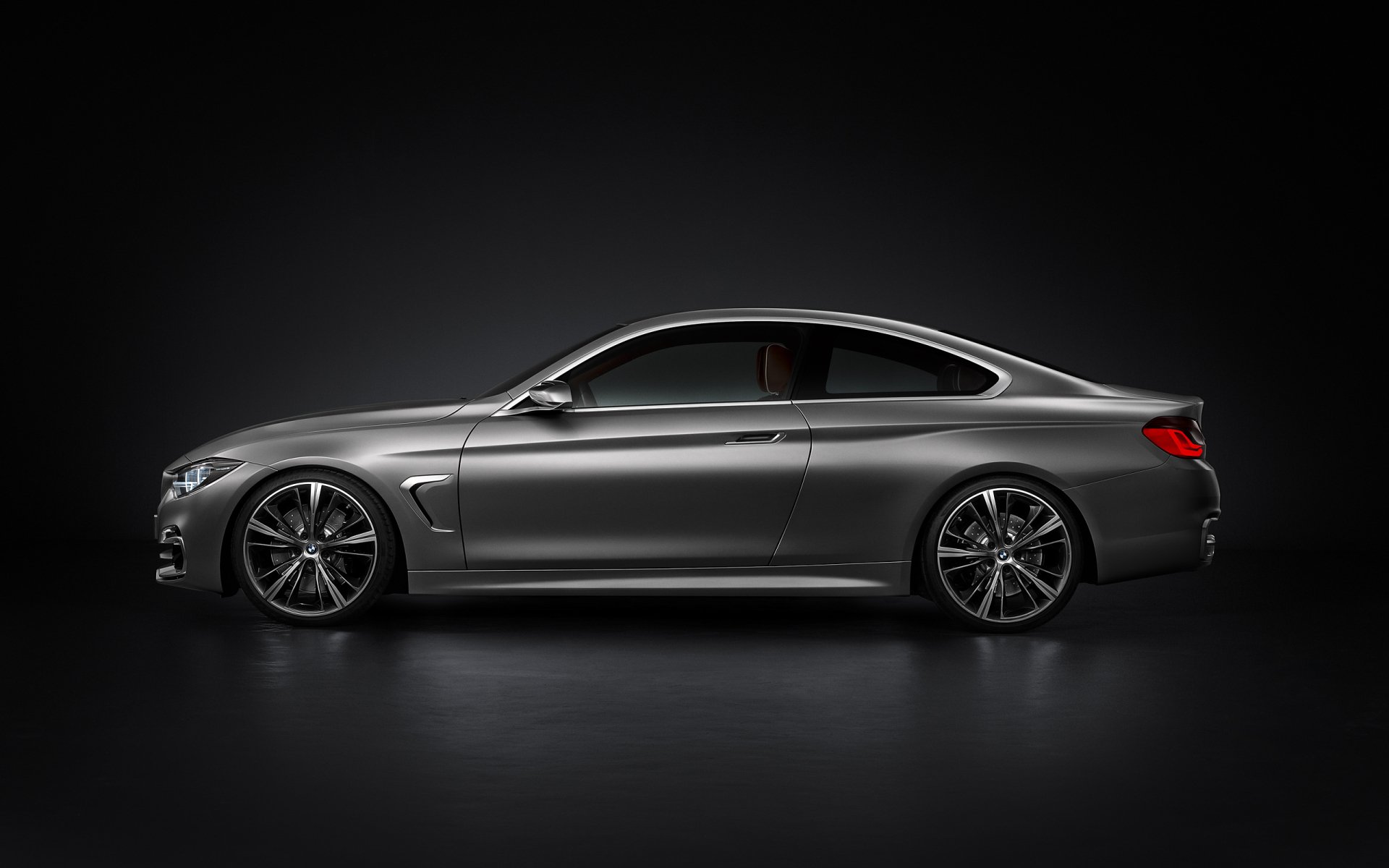 Silver BMW Concept 4 Series Coupé side profile on dark gradient — 2K Quad HD PC desktop wallpaper of the vehicle.