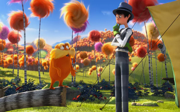 HD PC desktop wallpaper: The Once-ler and the Lorax from The Lorax movie stand amid colorful Truffula trees under a bright sky on rolling grassy hills.
