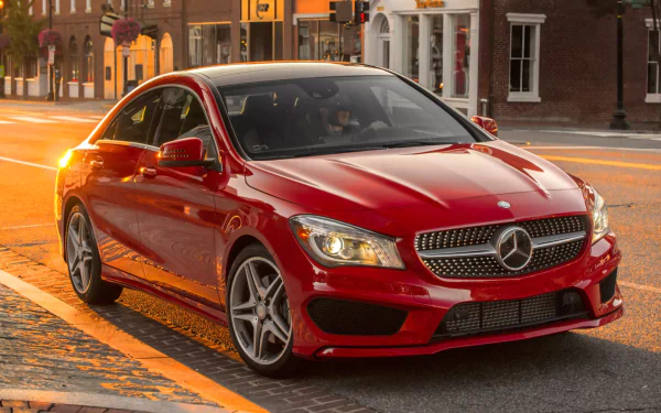 A red Mercedes-Benz CLA-Class parked on a city street at sunset, captured in an HD PC desktop wallpaper and background.