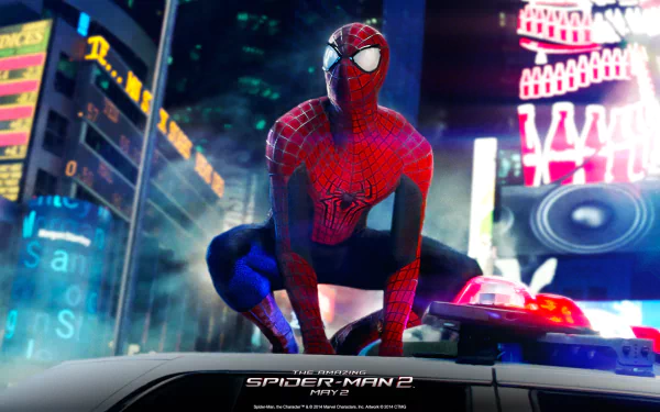 HD desktop wallpaper of Spider-Man from The Amazing Spider-Man 2 movie, posed atop a police car with brightly lit cityscape in the background.