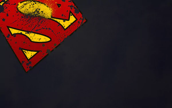 HD PC desktop wallpaper featuring a distressed red and yellow Superman logo on a dark background, inspired by the iconic comic symbol.