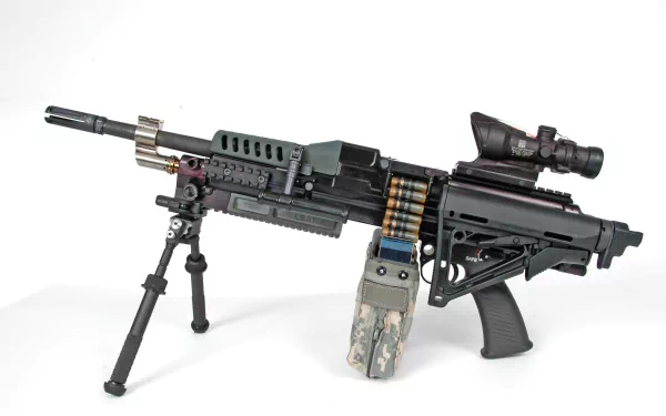 A high-definition desktop wallpaper featuring a detailed close-up of a man-made machine gun, showcasing its intricate design and tactical elements.
