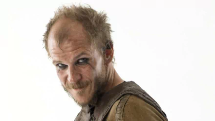 HD PC wallpaper featuring Gustaf Skarsgård as Floki from the TV show Vikings (2013), against a plain white background.