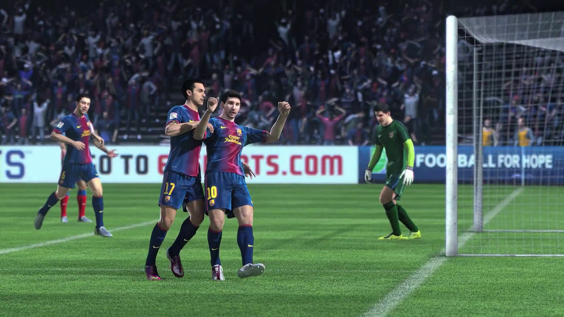 HD PC desktop wallpaper featuring a lively scene from FIFA 14, showcasing players celebrating a goal in a packed stadium, with a goalkeeper and cheering fans in the background.
