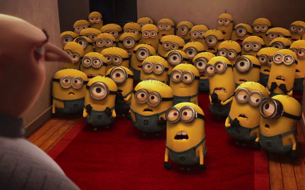 Gru stands in front of a crowd of Minions, who display a range of emotions in this vibrant HD wallpaper from the movie Despicable Me. A fun backdrop for fans of the film.
