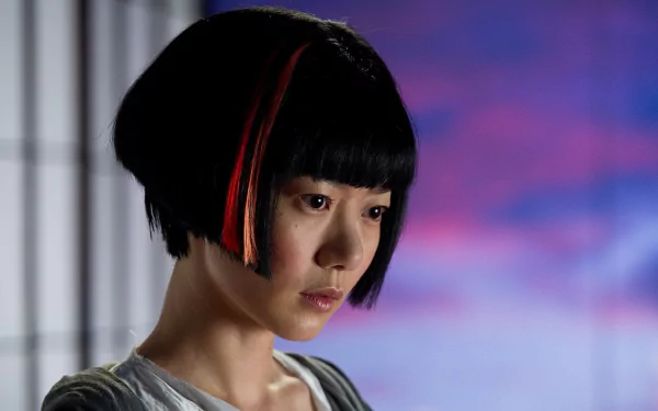 HD PC desktop wallpaper featuring a close-up of a character from the movie Cloud Atlas against a softly blurred purple and blue background.
