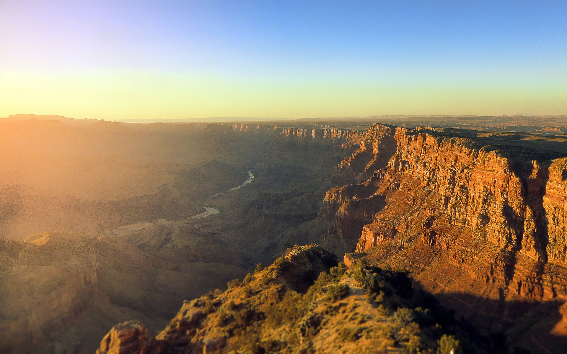 Sunrise over the Grand Canyon, showcasing the stunning rock formations and vast landscapes of this iconic national park in the USA, captured in vibrant HD detail.