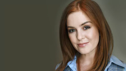 HD PC desktop wallpaper featuring Australian actress and celebrity Isla Fisher with a subtle smile against a muted background.