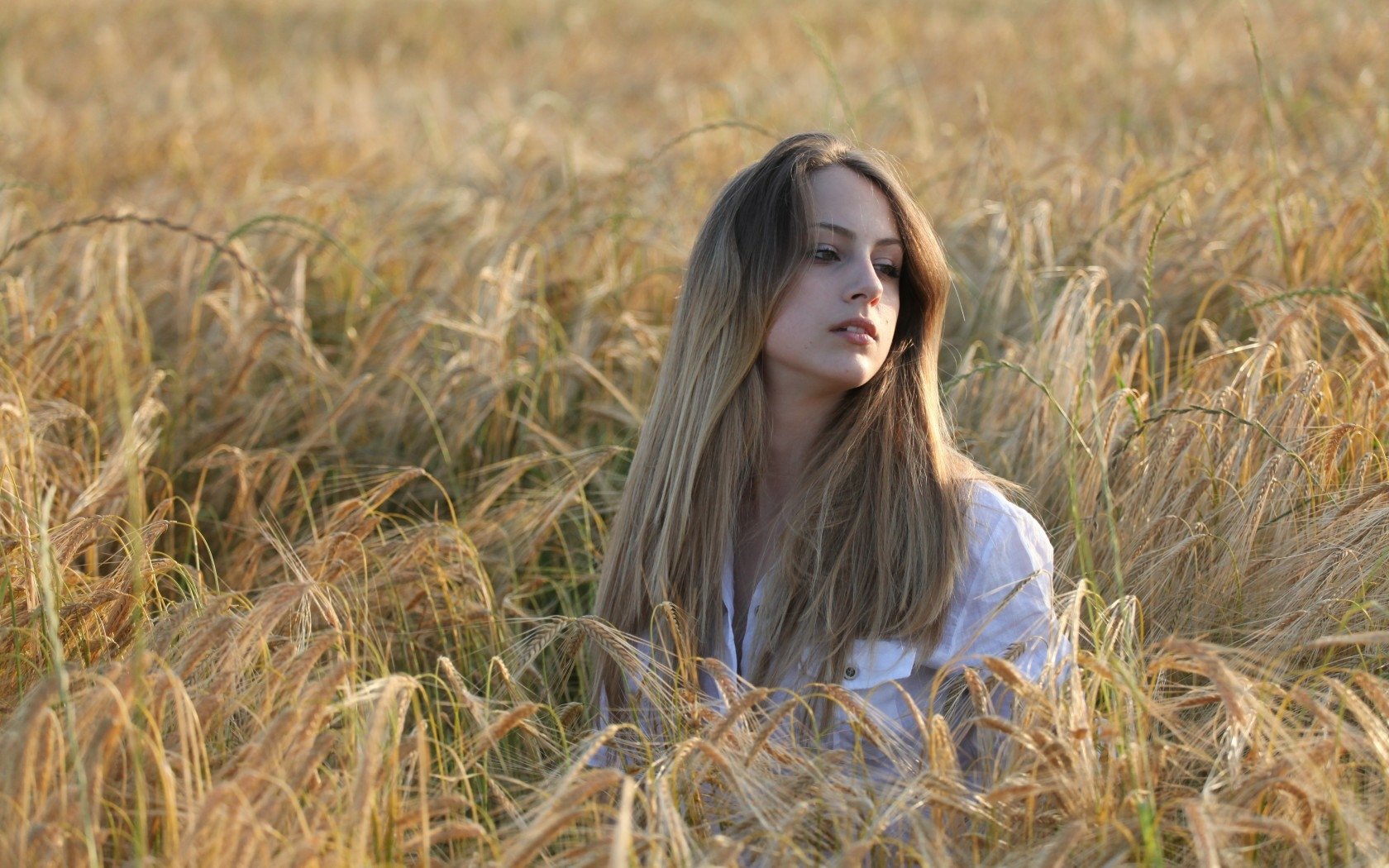 Serene Mood: A Captivating HD Wallpaper of a Woman in Nature by Elido Turco