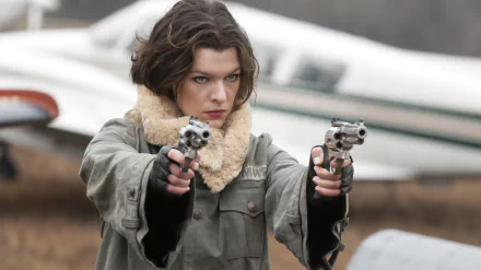 Milla Jovovich, armed with twin handguns, portrays a fierce character in Resident Evil: Afterlife, captured in this dynamic 4K Ultra HD desktop wallpaper.