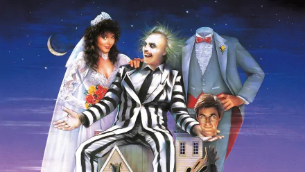 HD PC desktop wallpaper: video game Beetlejuice artwork — striped-suit Beetlejuice perched on a model house, bride beside him, headless suit holding a man's head under a starry crescent moon