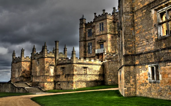 HD desktop wallpaper of Bolsover Castle showcasing its historic, man-made stone architecture under a moody sky.