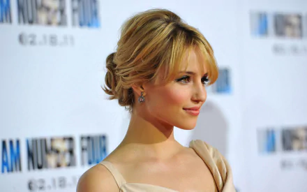 HD PC desktop wallpaper featuring American actress and celebrity Dianna Agron with an elegant updo and neutral-toned attire at a red carpet event.