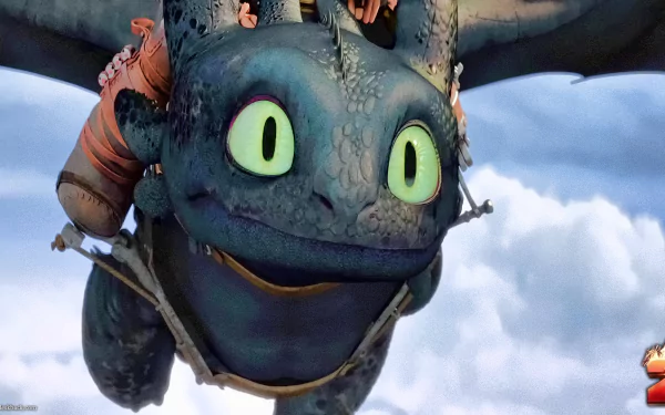 HD wallpaper of Toothless from How to Train Your Dragon 2 with a playful expression against a cloudy sky background.