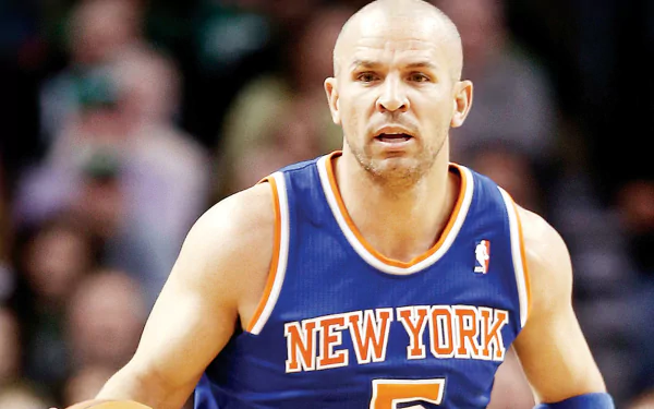 HD wallpaper featuring a focused basketball player in a New York jersey, providing a dynamic desktop background option.