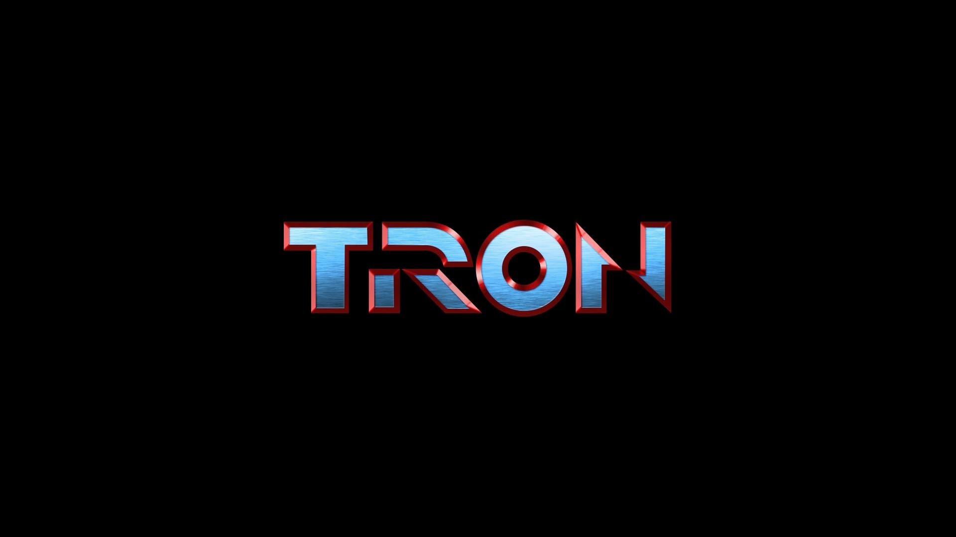 HD PC desktop wallpaper featuring the iconic blue and red TRON movie logo against a black background.