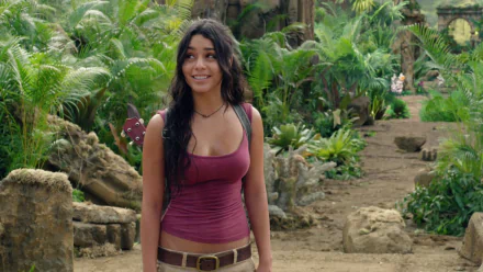 HD PC desktop wallpaper featuring a scene from the movie Journey 2: The Mysterious Island with a woman standing amidst lush tropical greenery.