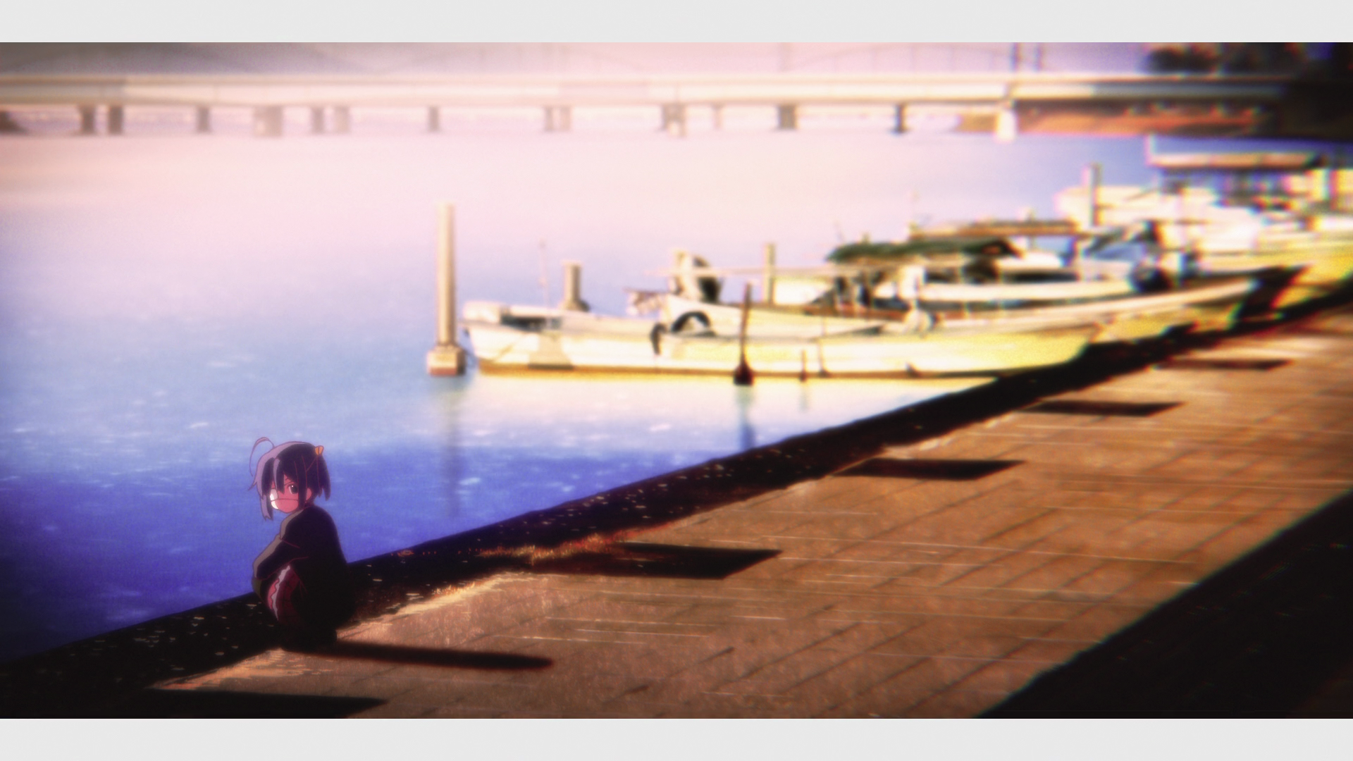 A serene HD wallpaper featuring Rikka Takanashi from Love, Chunibyo & Other Delusions, sitting by a tranquil waterfront with boats in the distance.