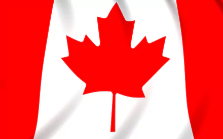 HD desktop wallpaper featuring the flag of Canada. The design prominently displays a red maple leaf on a white background with red bars on either side.