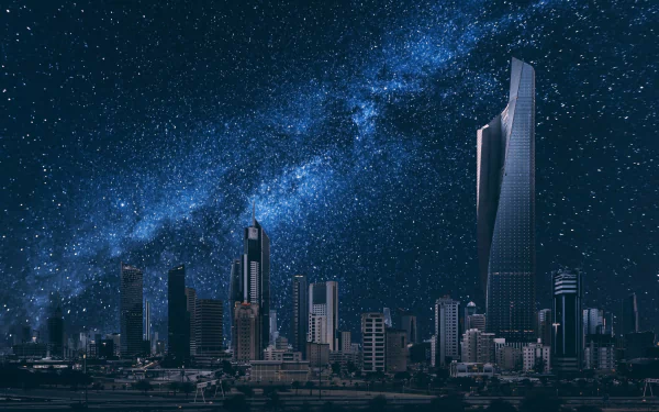 A stunning view of Kuwait City featuring modern skyscrapers under a starry night sky, showcasing the vibrant man-made landscape of this dynamic city. HD wallpaper background.