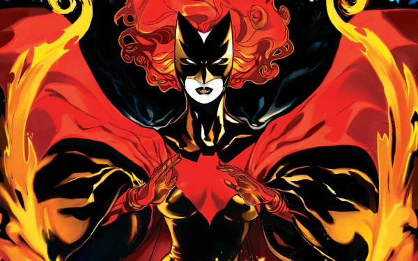 HD PC desktop wallpaper/background: comic Batwoman in a red-and-black suit with fiery flowing hair and cape, hands forming a bat symbol amid stylized flames on a dark backdrop.