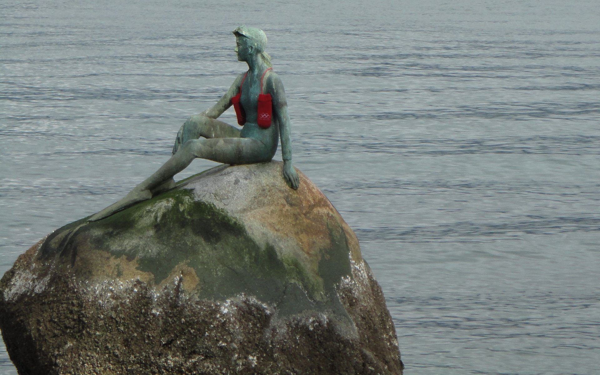 Download Man Made Girl In A Wetsuit Statue HD Wallpaper