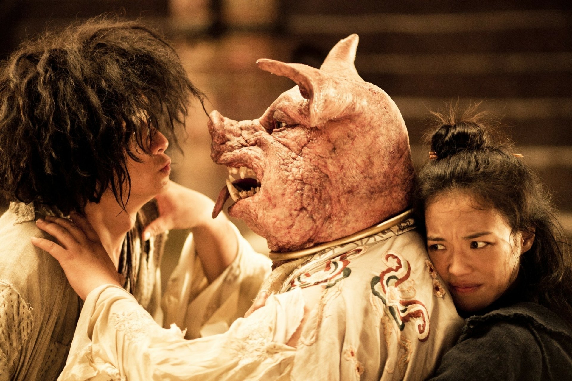 HD wallpaper of 'Journey To The West' characters: a person with a pig's head in a tense moment with two others.