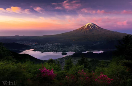 Scenic view of Mount Fuji at sunset in Japan, with vibrant sky and tranquil lake, captured in an HD nature wallpaper.