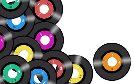 Colorful retro vinyl records overlapping on a white background, creating a vintage music-themed HD desktop wallpaper.