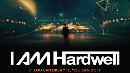 A striking HD wallpaper featuring DJ Hardwell in a vibrant concert setting, with the phrase I AM Hardwell prominently displayed, capturing the energy of music and performance.