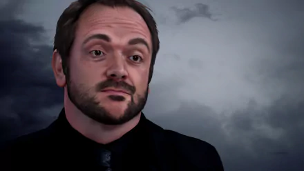 An HD desktop wallpaper featuring Mark Sheppard as Crowley, the demon from the TV show Supernatural, set against a dramatic background.