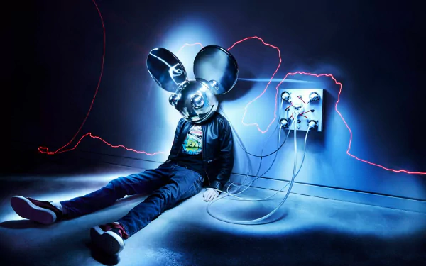 HD PC desktop wallpaper featuring Deadmau5, depicted sitting against a wall with a futuristic mouse head and colorful neon lighting, embodying his unique electronic music style.