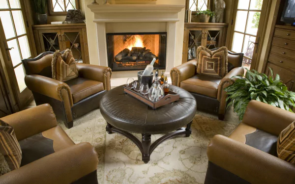 armchair table fireplace man made room HD Desktop Wallpaper | Background Image