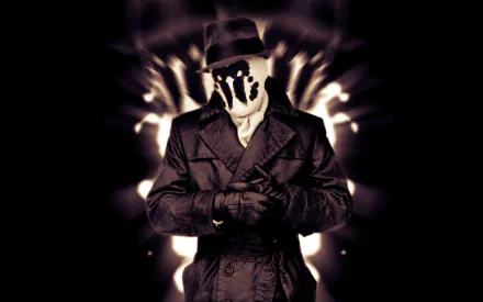 HD desktop wallpaper of Rorschach from the Watchmen movie, featuring his iconic inkblot mask and trench coat in a dark, dramatic background.