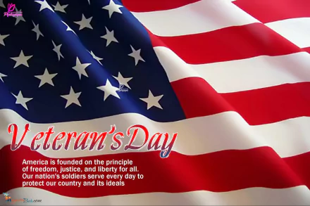 HD desktop wallpaper featuring a waving American flag with Veteran's Day text honoring freedom, justice, and the nation's soldiers.