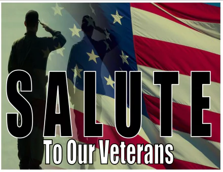 HD PC desktop wallpaper for Veterans Day holiday: silhouetted servicemembers saluting before a large American flag with bold text SALUTE To Our Veterans.