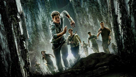 HD PC desktop wallpaper featuring characters running through a dark, towering maze from the movie The Maze Runner.