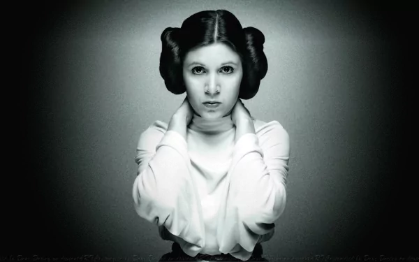HD desktop wallpaper of Carrie Fisher as Princess Leia from the Star Wars movie, featuring a monochrome portrait with her iconic hairstyle and white outfit.