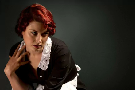 HD PC desktop wallpaper featuring Alexandra Breckenridge from the TV show American Horror Story, showcasing her in a dark setting with intense expression and vintage-style attire.
