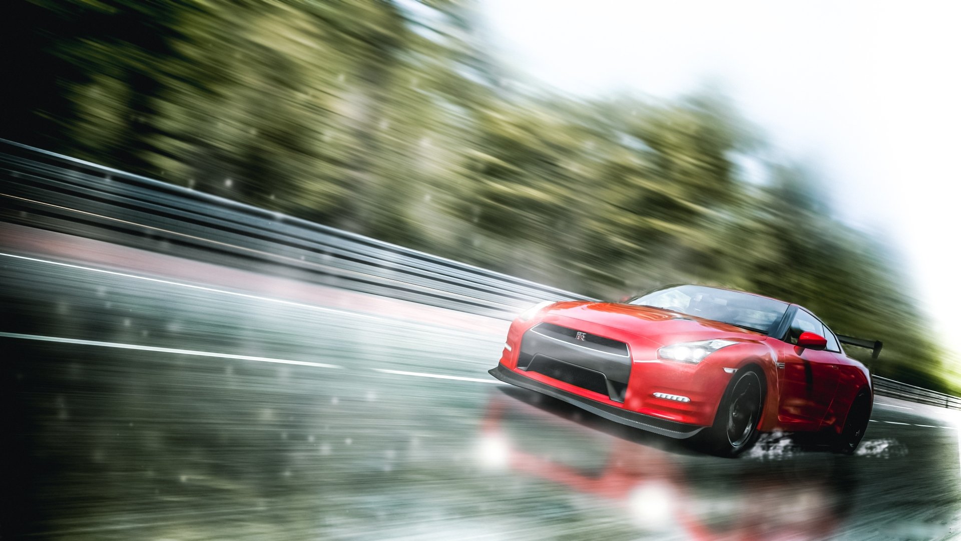 A dynamic Nissan GT-R races along a wet track, capturing the thrill of speed and driving excitement in this HD desktop wallpaper and background.