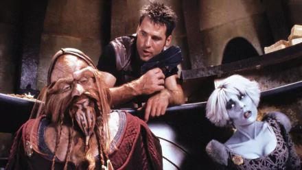 HD PC desktop wallpaper of a scene from the TV show Farscape: a man with a blaster leans over a tentacled alien and a pale blue-skinned woman inside a dim spacecraft interior.